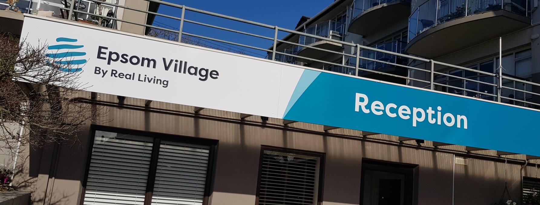 Building signs and stickers for reception, glass frosting, plythn signage, and carpark signs Epsom Auckland